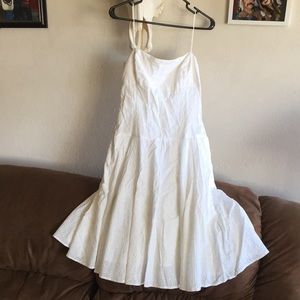 White eyelet dress with thin straps and zip back